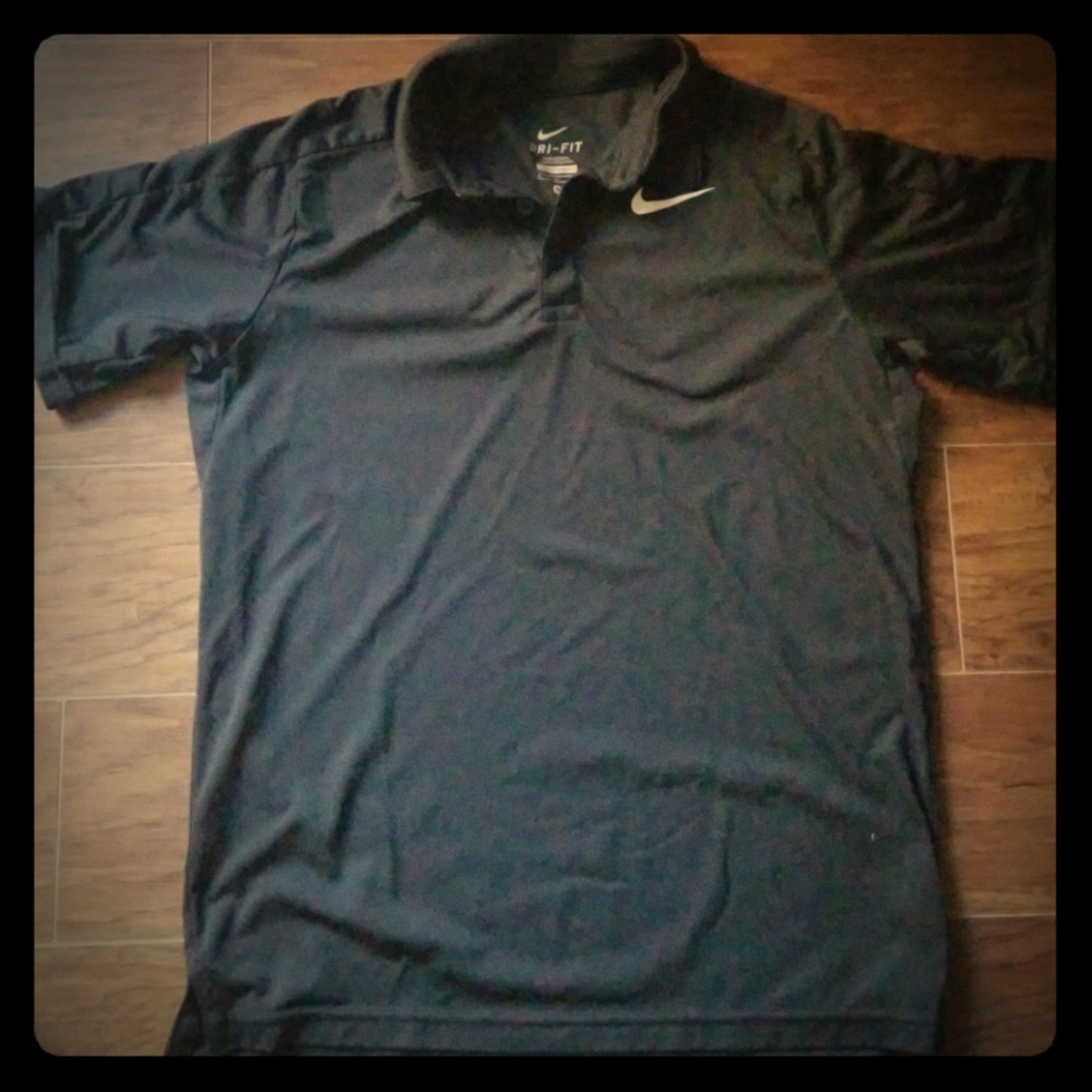 Nike collared dri-fit shirt. Big boys size medium